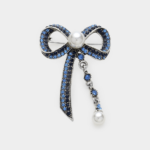 Pearl Accented Stone Paved Ribbon Pin Brooch